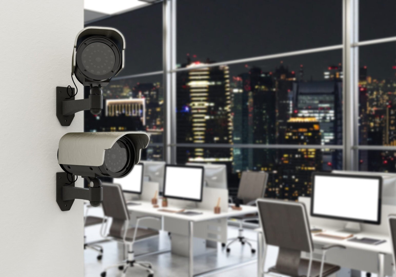 Security cameras overlooking modern office space.